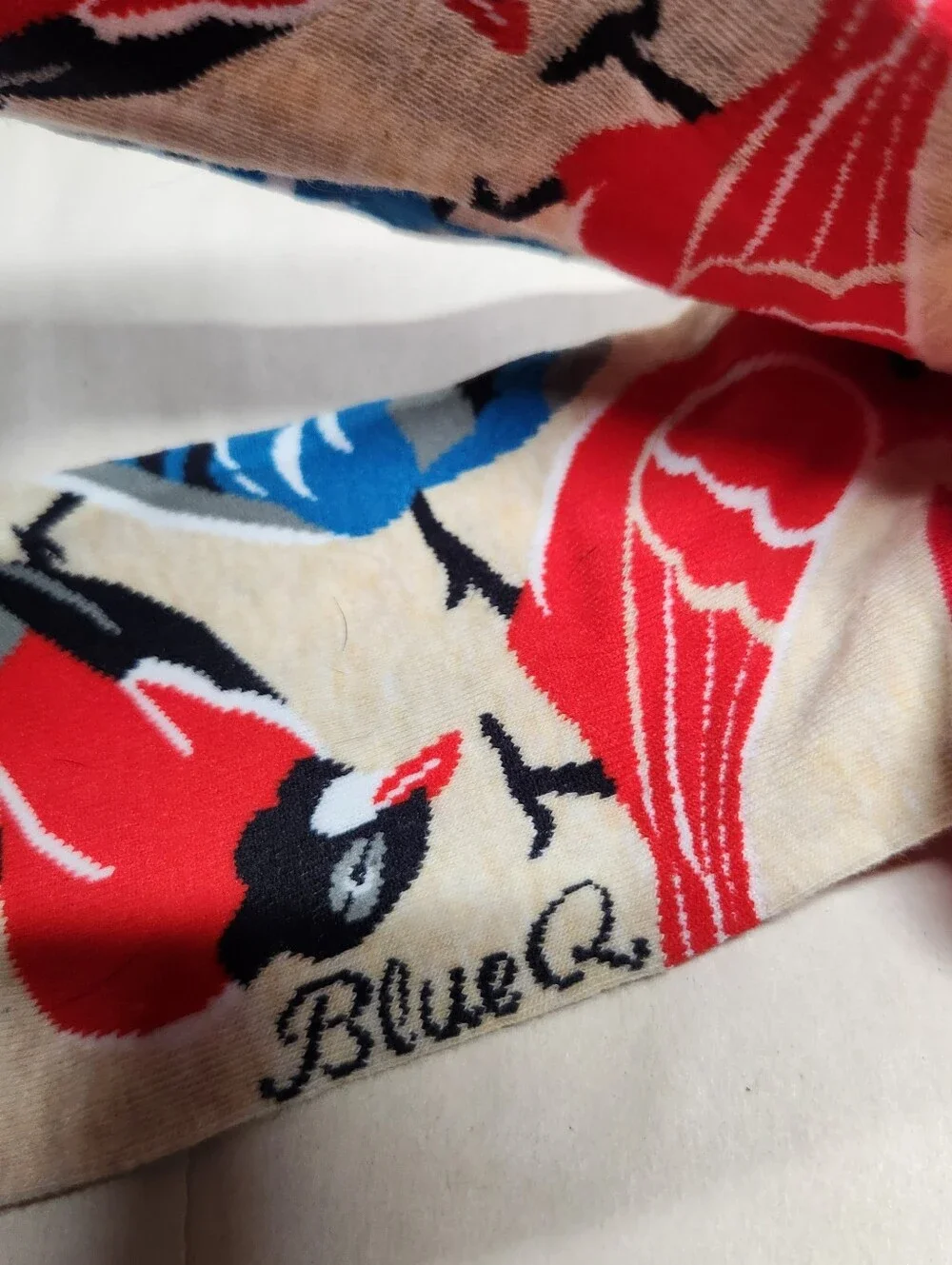 Blue Q Im Really Into Birds Socks with Red Accents and Multicolored Bird Design